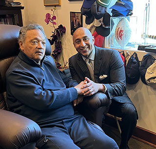 Rajan with Jesse Jackson